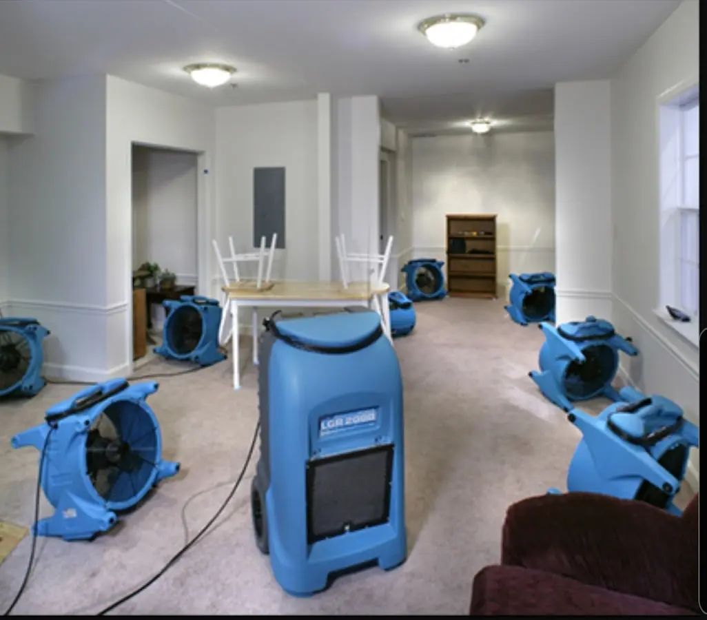 Air movers and dehumidifier setup for Water Damage Restoration in Bastrop